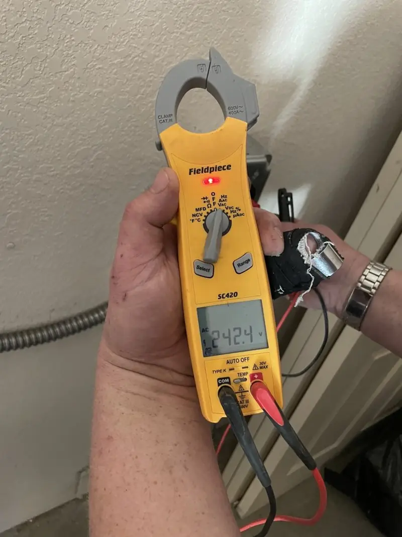 Voltage testing with clamp meter during Circuit Breaker Repair in Silver Spring